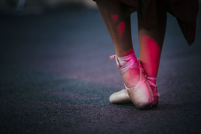 Low section of ballet dancer on street