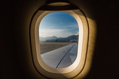 View of airplane through window