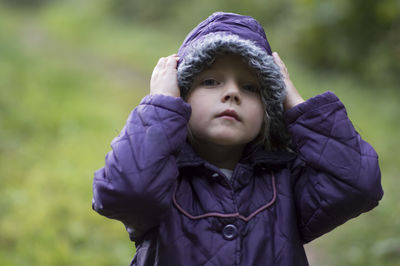 Close-up of baby girl outdoors
