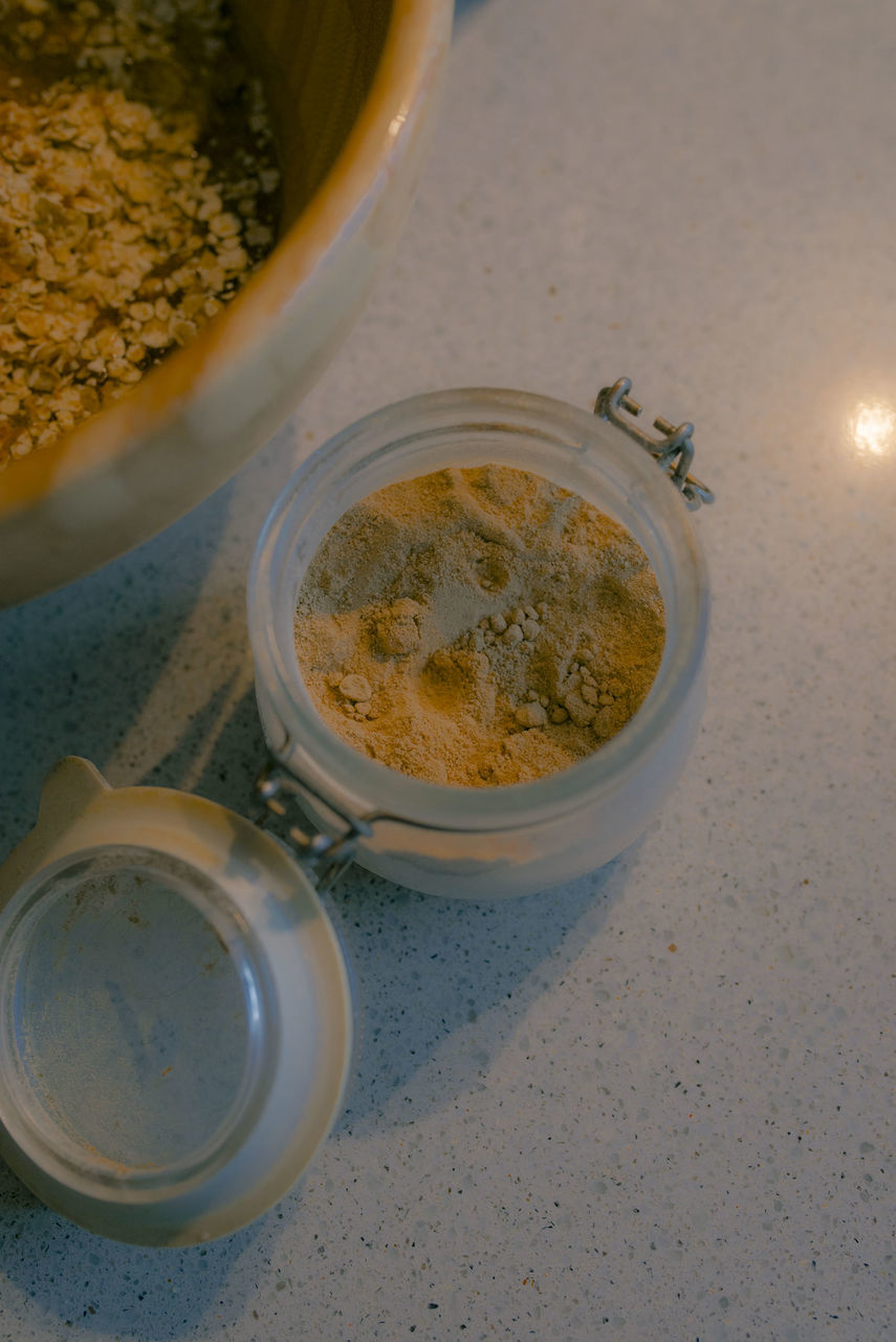 HIGH ANGLE VIEW OF DRINK IN JAR ON TABLE