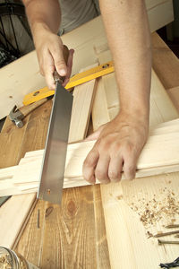 Close-up of man working on table