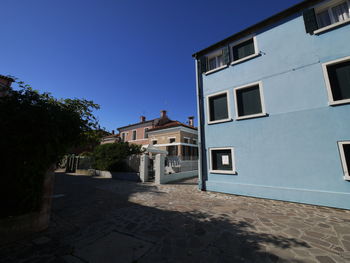 Buildings against blue sky