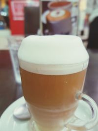 Close-up of coffee cup on table