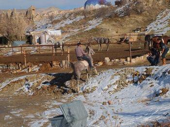 Man standing on snow covered mountain