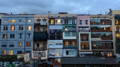 Buildings against sky in city