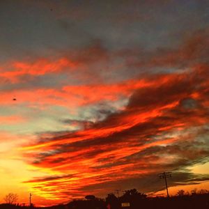 Low angle view of dramatic sky during sunset