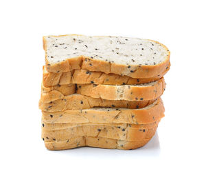 Close-up of bread against white background