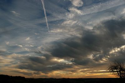 Scenic view of landscape against cloudy sky