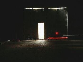 Close-up of illuminated surface level of tiled wall