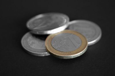 High angle view of euro coins on table