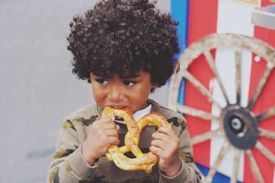 Portrait of boy holding ice cream