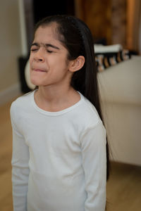 Portrait of young woman looking away