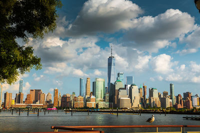 Modern buildings in city against sky