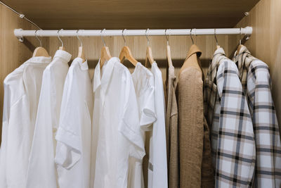 Close-up of clothes hanging on rack