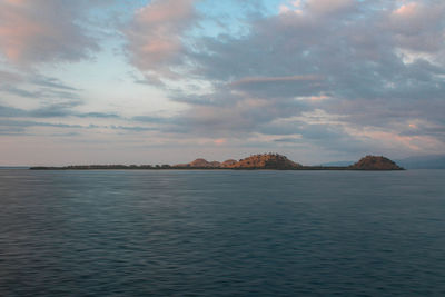 Scenic view of sea against sky at sunset