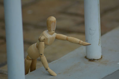 Close-up of pipe on metal railing