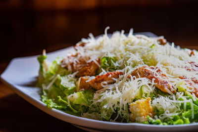 Close-up of salad served in plate on table