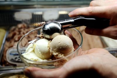 Person holding ice cream