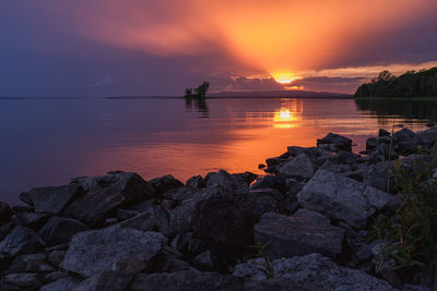 Scenic view of sea against sky during sunset