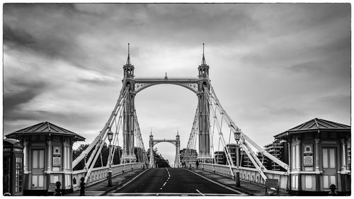 View of bridge against cloudy sky