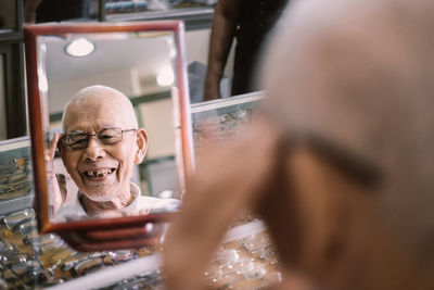 Portrait of old man at the optometrist