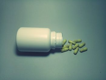 High angle view of bottles on table
