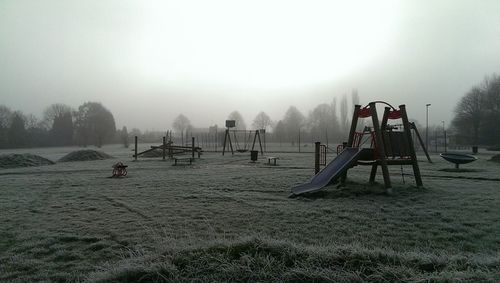 View of playground in foggy weather
