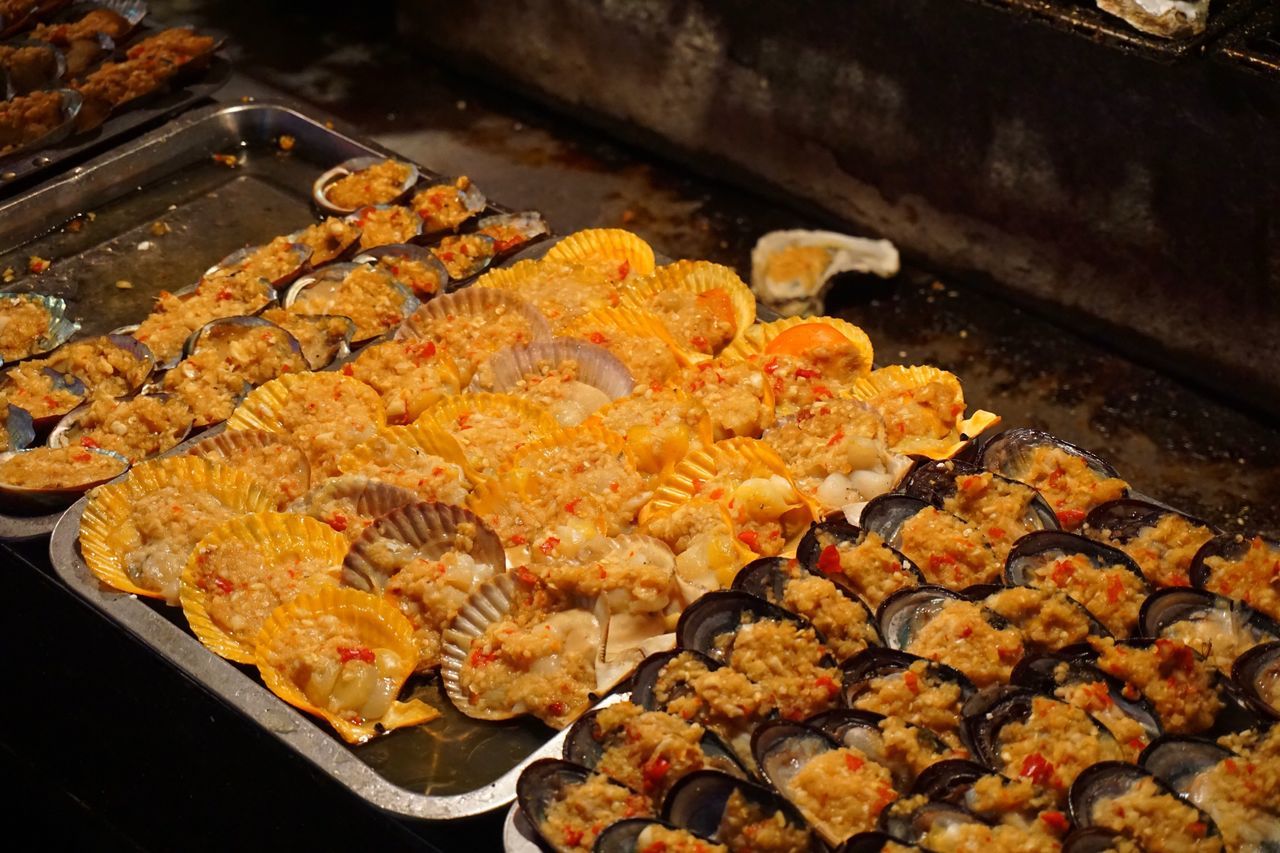 food, food and drink, freshness, preparation, barbecue grill, cooking, healthy eating, meat, heat - temperature, high angle view, preparing food, close-up, barbecue, grilled, indoors, still life, grill, no people, autumn, selective focus