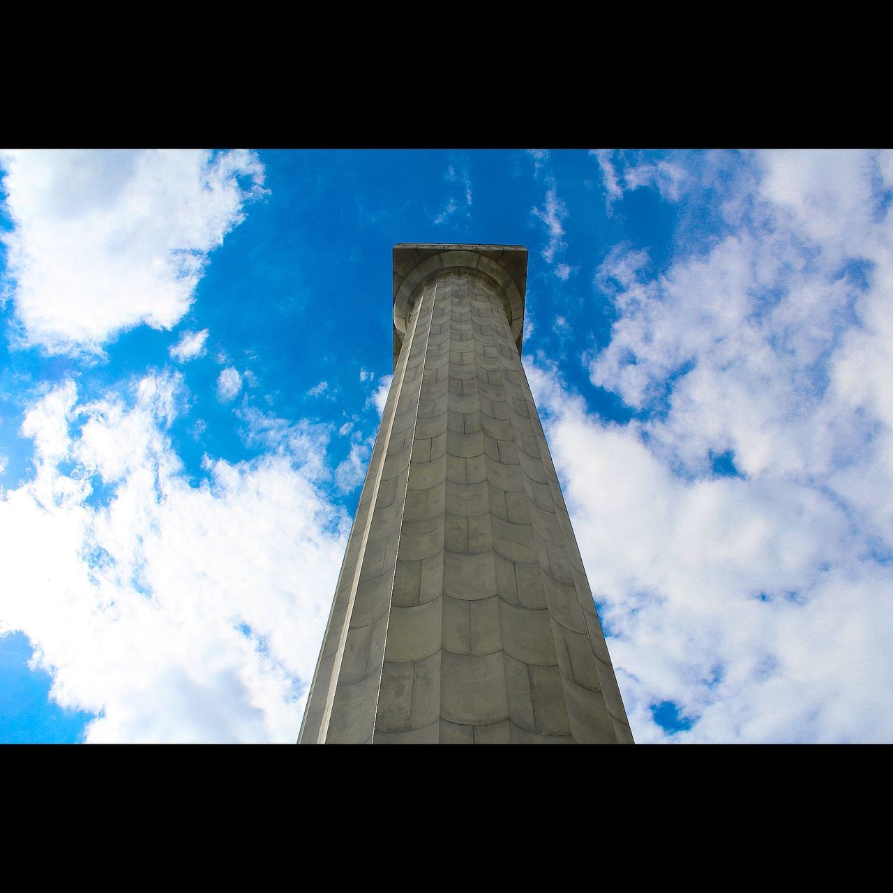 sky, low angle view, architecture, built structure, cloud - sky, monument, travel destinations, pyramid, day, history, no people, ancient, architectural column, ancient civilization, outdoors