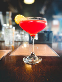 Close-up of wineglass on table