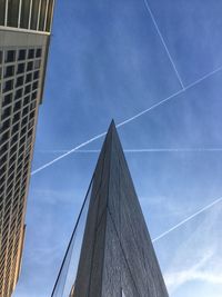 Low angle view of building against blue sky