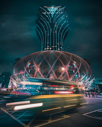 ILLUMINATED FERRIS WHEEL IN CITY