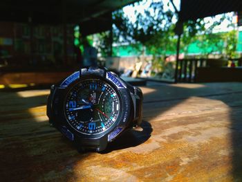 Close-up of clock on table