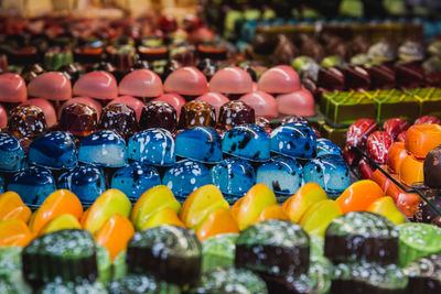 Close-up of multi colored candies in store