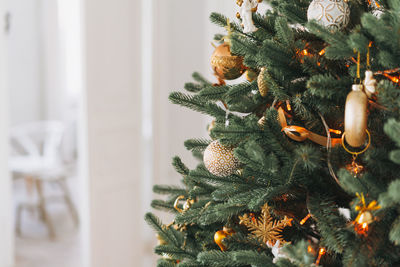 Close-up of christmas tree at home