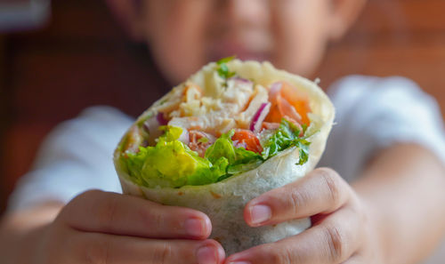 Close-up of person holding ice cream