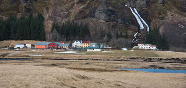 Scenic view of field against mountain