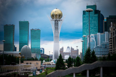 Modern buildings in city against sky