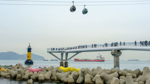 View of bridge over sea against clear sky