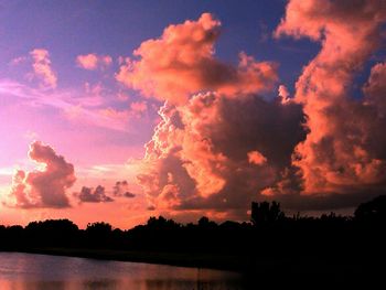 View of calm lake against scenic sky