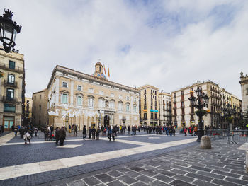 Group of people in front of building