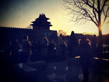 Silhouette of woman at sunset