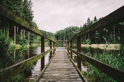 Wooden boardwalk at lake