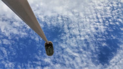 Low angle view of street light against sky