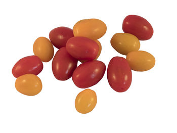 Close-up of oranges over white background