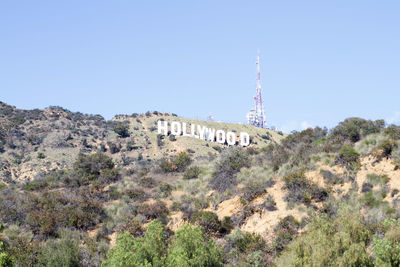 Panoramic view of trees and buildings against clear sky