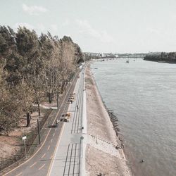 High angle view of railroad tracks in city against sky