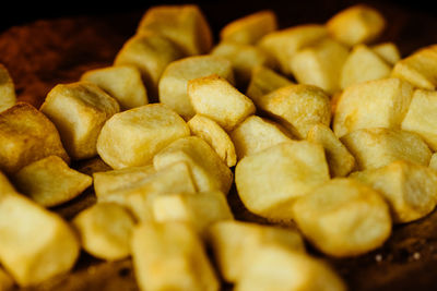 Close-up of roasted coffee beans against black background