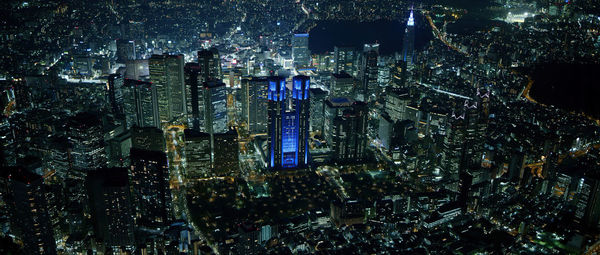 High angle view of illuminated buildings in city at night,tokyo,japan