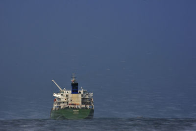 Ship in sea against sky